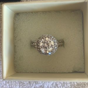 Costume ring. Silver with clear stone. Size 6